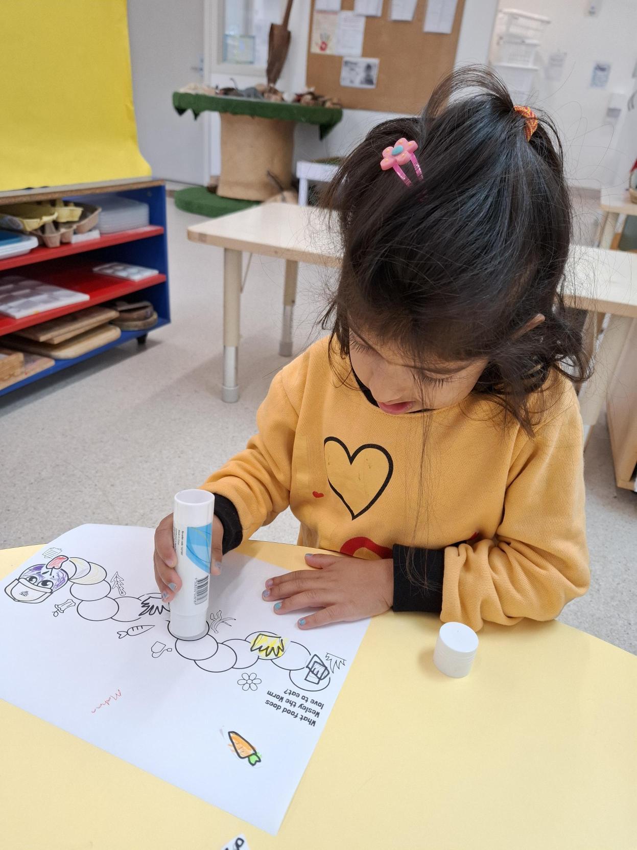 Female kid playing at Barnardos childcare centre in Mangere, New Zealand