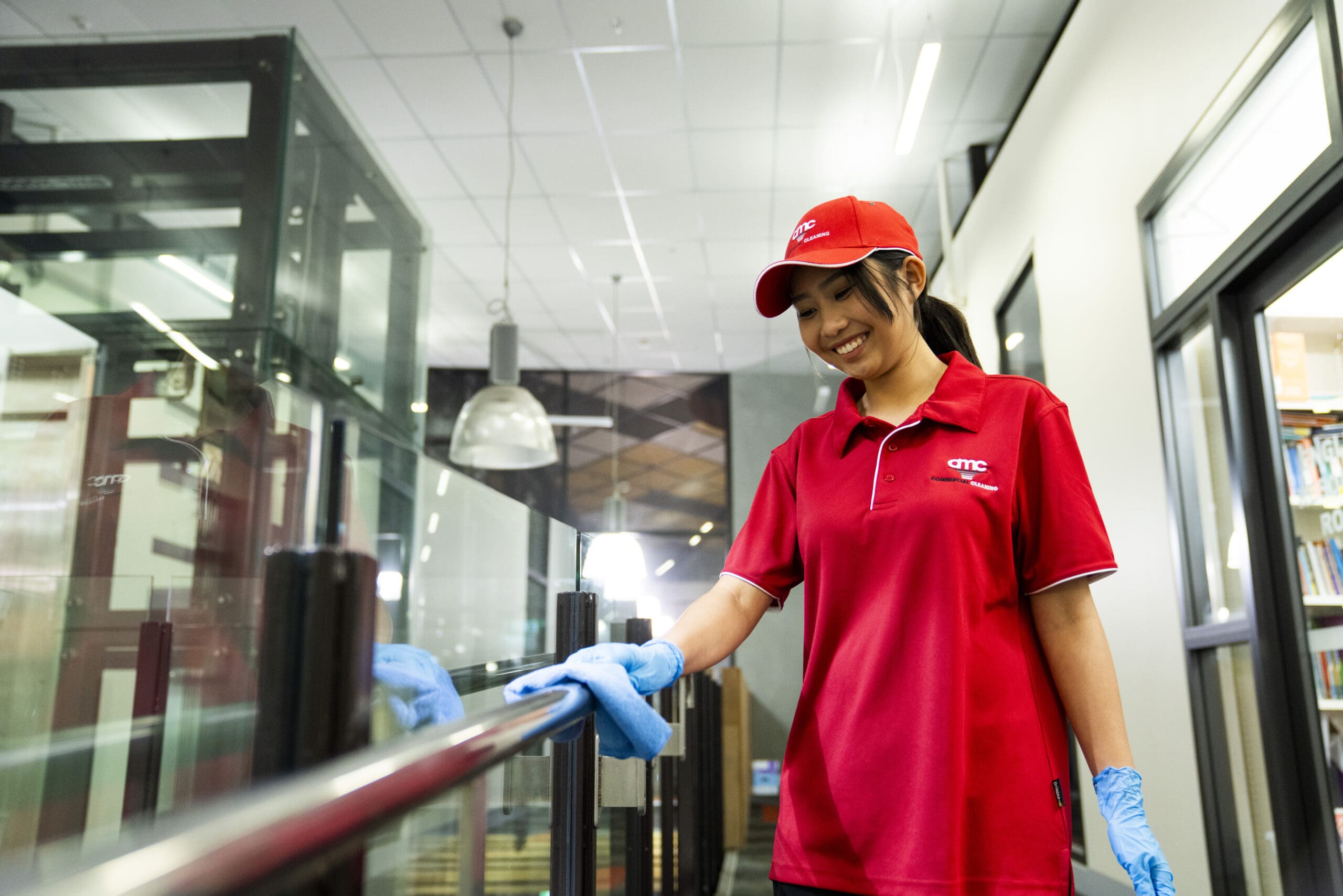 amc cleaner sanitising handle and high touch surfaces at office facility